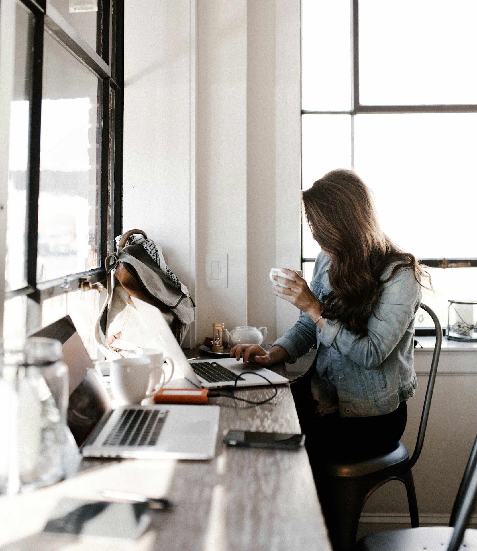 Woman at desk with laptop