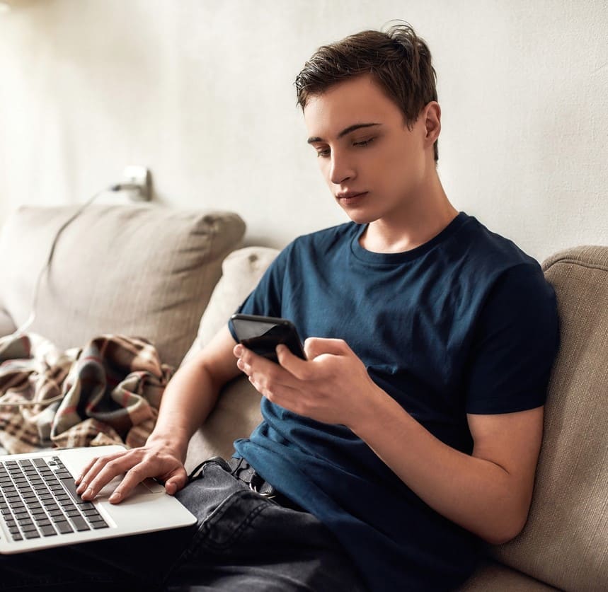 Teenager typing on phone