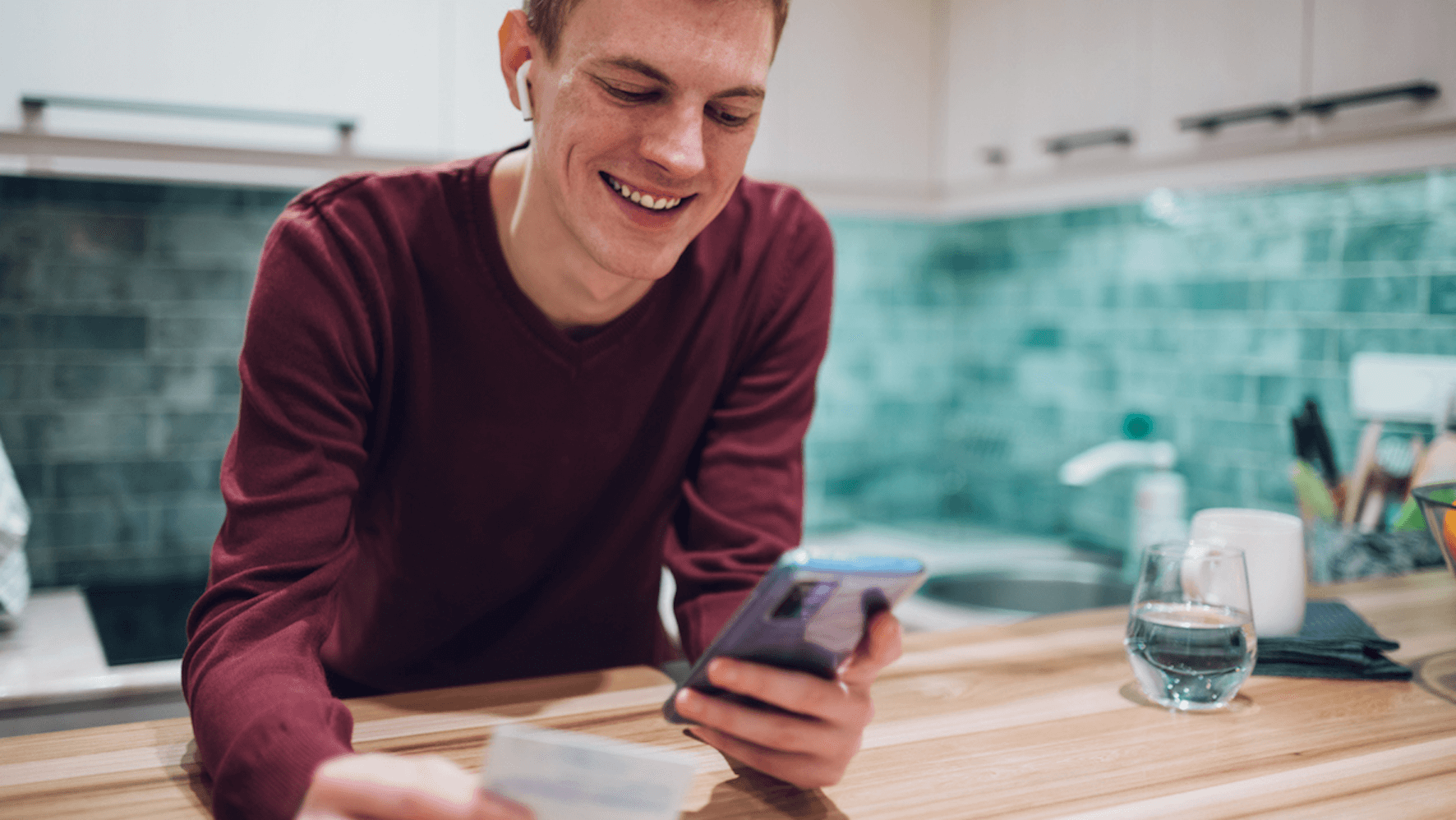 Young man watching a smartphone